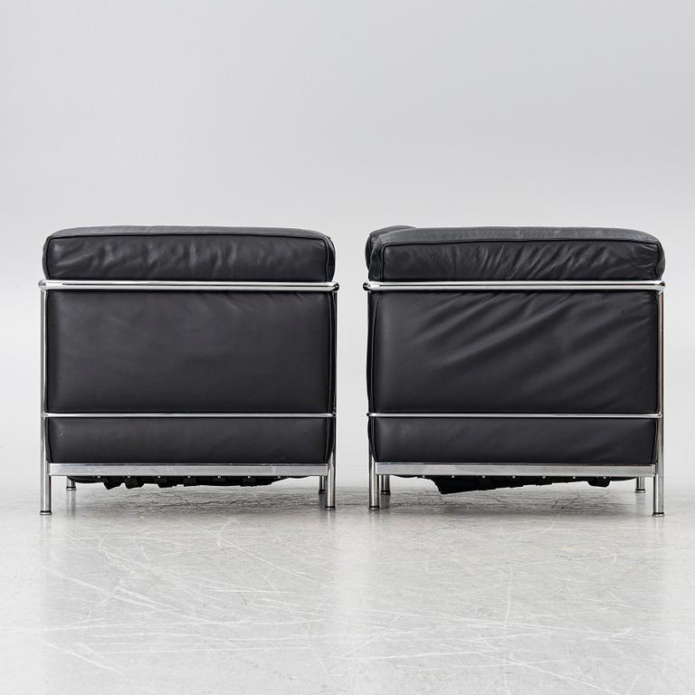 Le Corbusier (Charles-Édouard Jeanneret), Pierre Jeanneret, Charlotte Perriand & Le Corbusier, a pair of 'LC2' armchairs, Cassina.