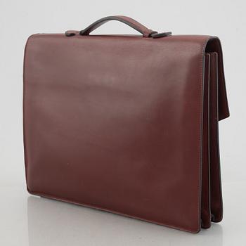 Cartier, a briefcase.