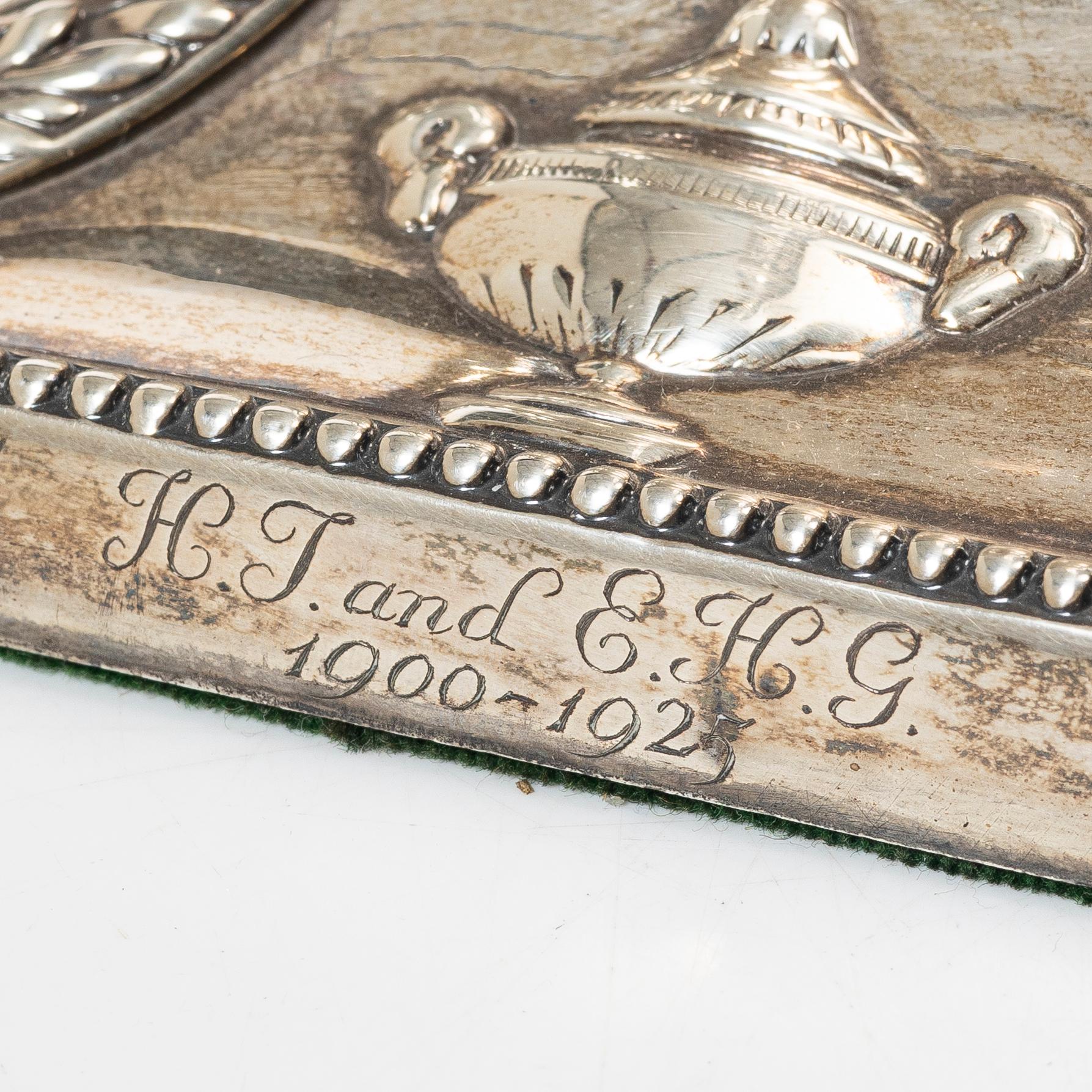 A pair of English silver candlesticks, mark of William Hutton & Sons Ltd, London 1902.