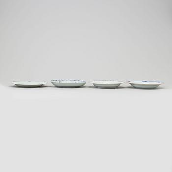 A set of four odd blue and white plates, Qing dynasty, Qianlong (1736-95).