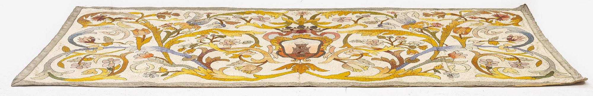 An antique silk embroidery, c. 187 x 88, around the year 1900.