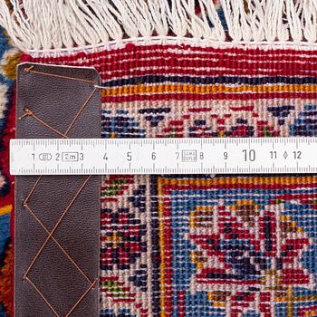 A Kashan carpet signed, approx. 420 x 292 cm.