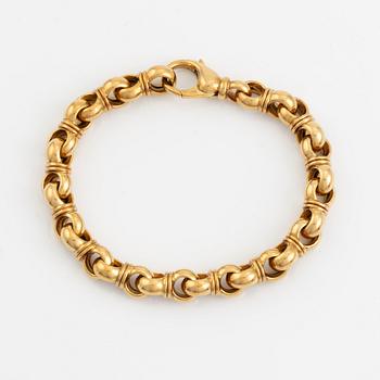 An 18K gold Tännler bracelet.