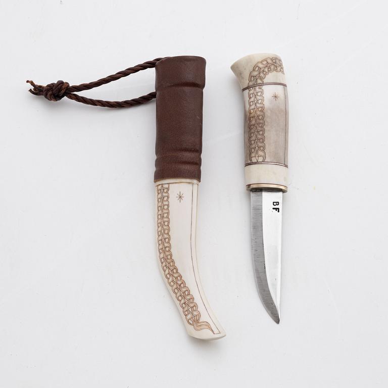 A reindeer horn knife by Bertil Fällman, signed.