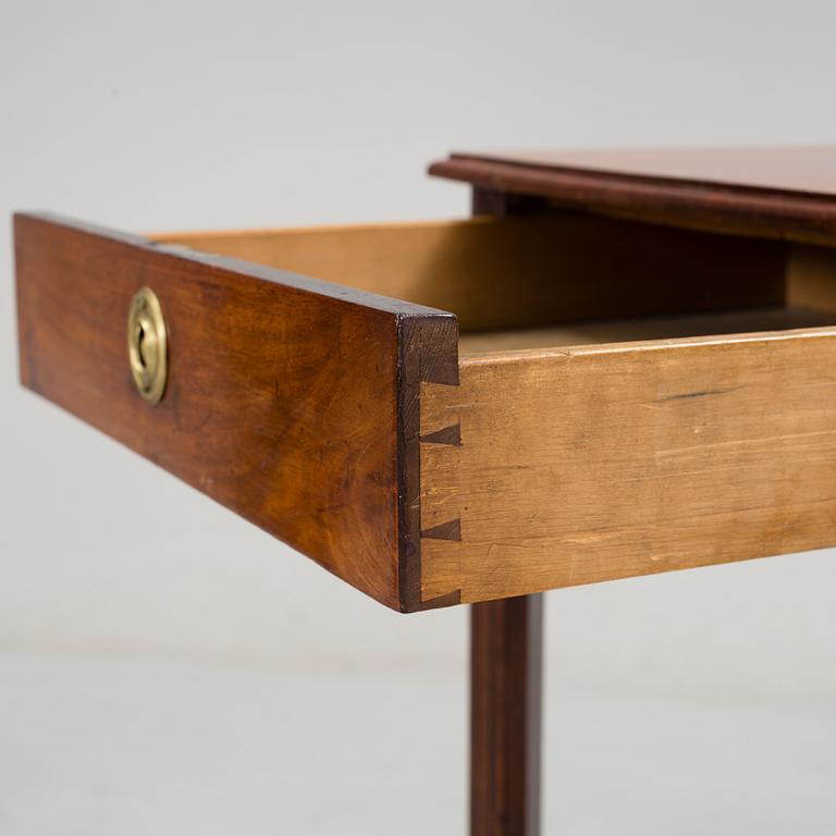A early 19th century mahogany table.