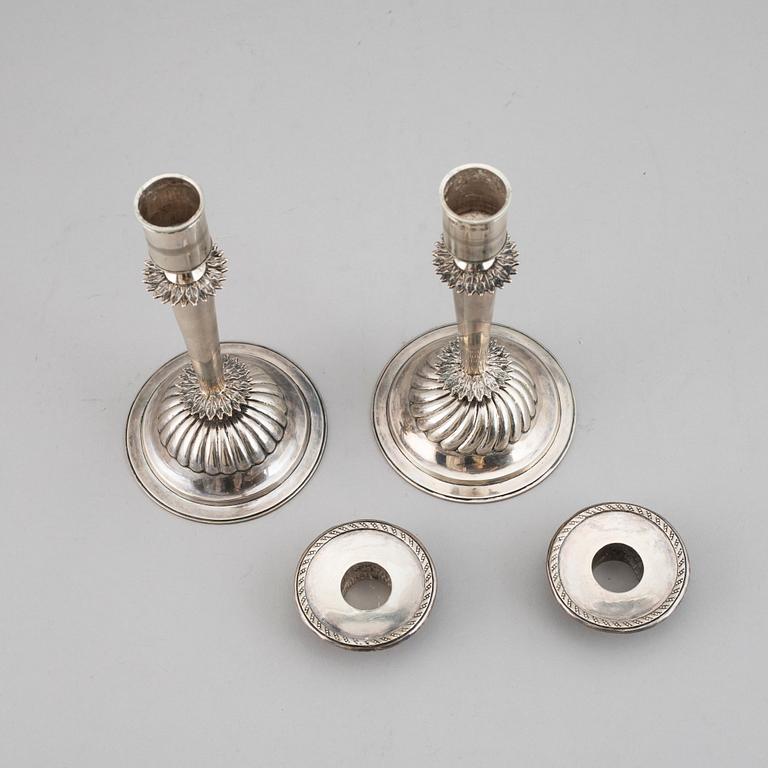 A pair of Empire silver candle sticks, 1823.