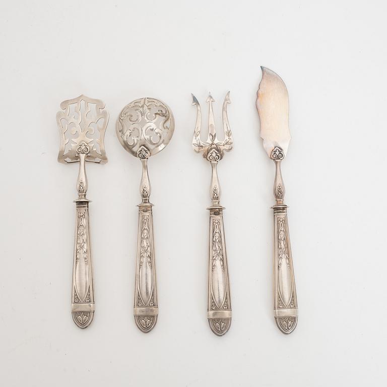 A set of four French silver serving cutlery.