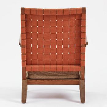 Axel Einar Hjorth, a stained pine "Väddö" easy chair, Nordiska Kompaniet, Sweden, 1930s-40s.