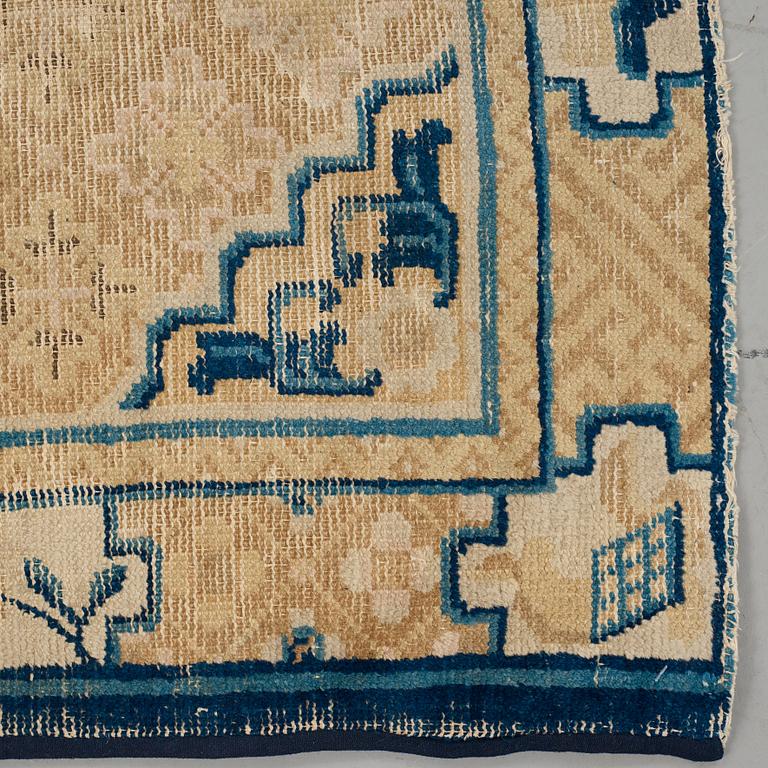 A RUG, an antique Ningxia, China, late Qing, ca 130 x 70,5 cm.