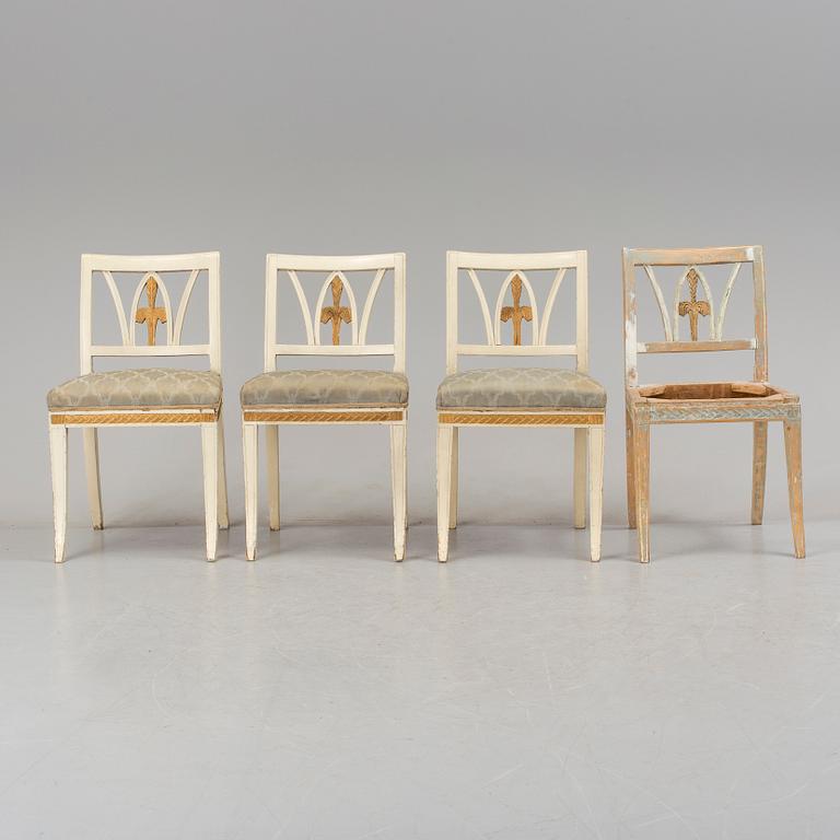 A set of four early 1800s chairs.