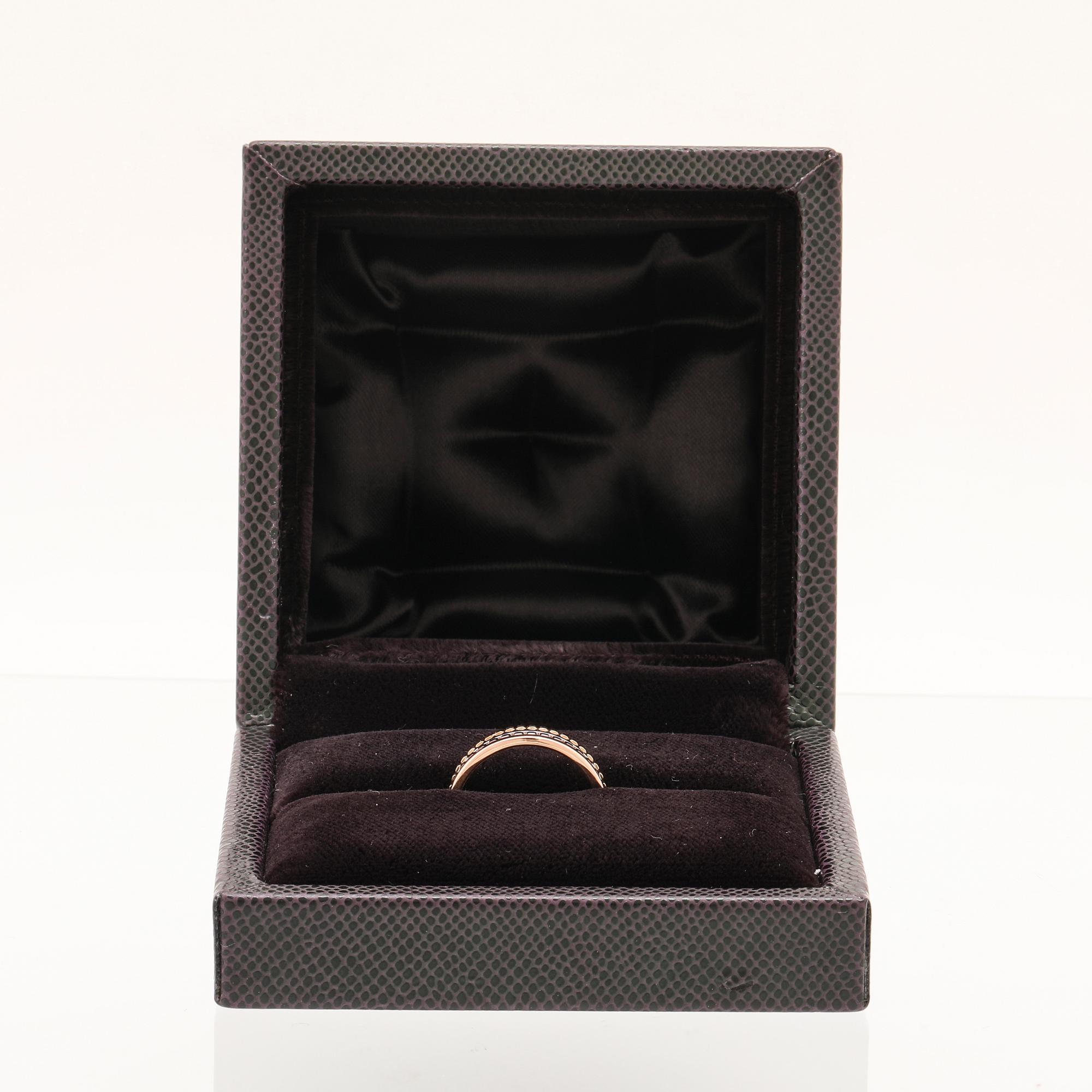 A “Quatre” ring in 18K yellow, pink, white gold and brown PVD by Boucheron.