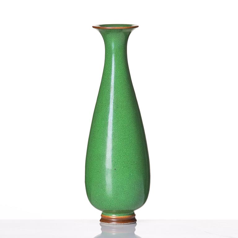 A Chinese apple-green-glazed vase, Qing dynasty.