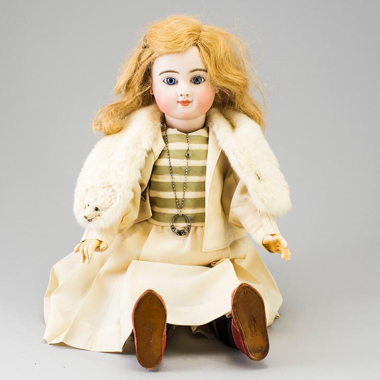 A bisque head doll by Jules Steiner, Paris, France, late 19th century.