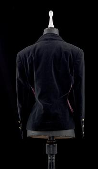 A 21th cent black velvet and cerise silk jacket by Chanel.