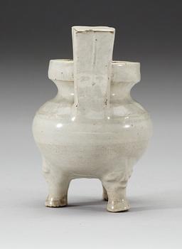 A pale grey-bluish glazed tripod censer with decor in relief, and archaistic mark, Ming dynasty (1368-1644).