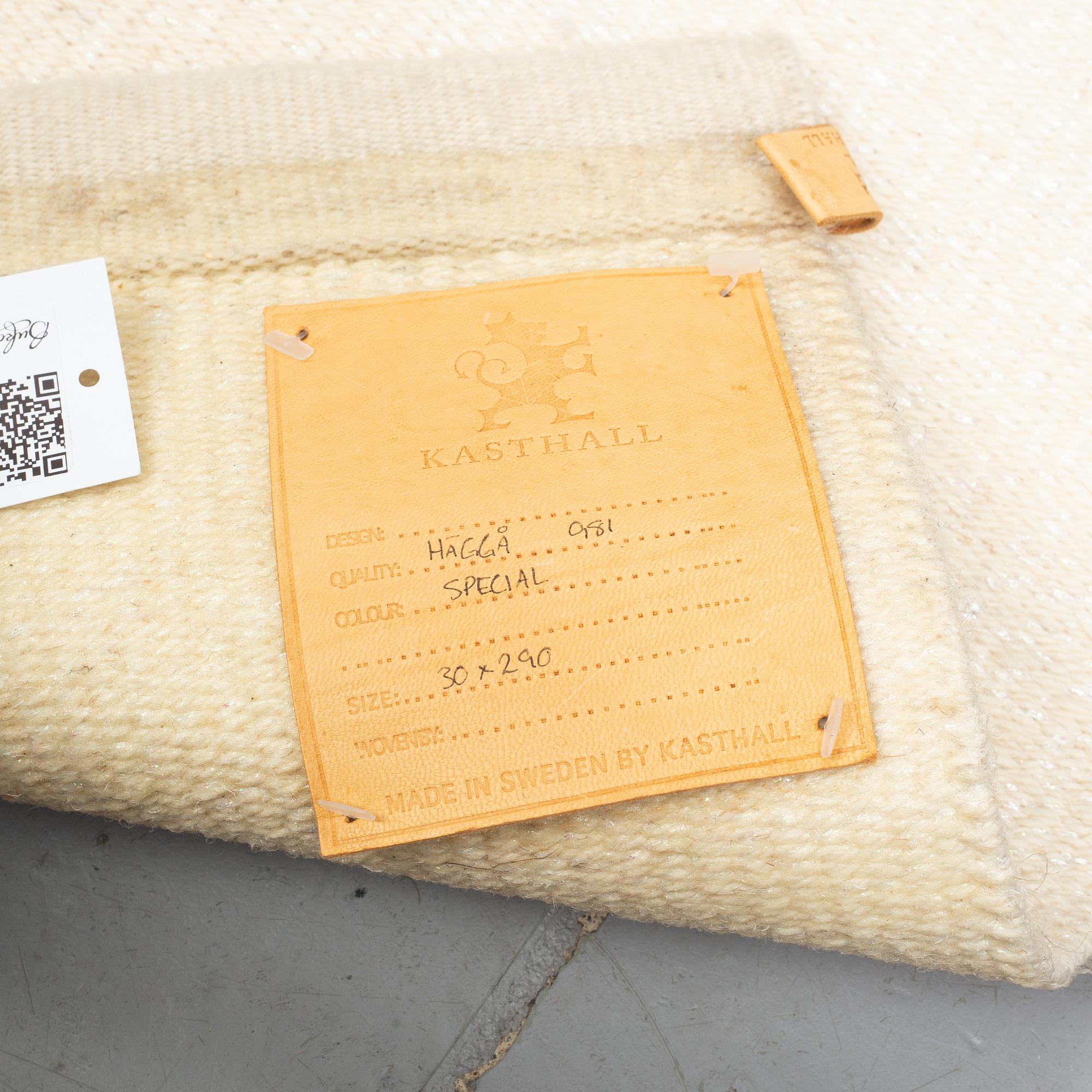 A carpet/textile, "Häggå 981", machin woven, Gunilla Lagerhem, Ullberg Kasthall, ca 290 x 30 and 70 cm.