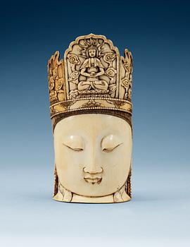A carved ivory head of Guanyin, Qing dynasty.