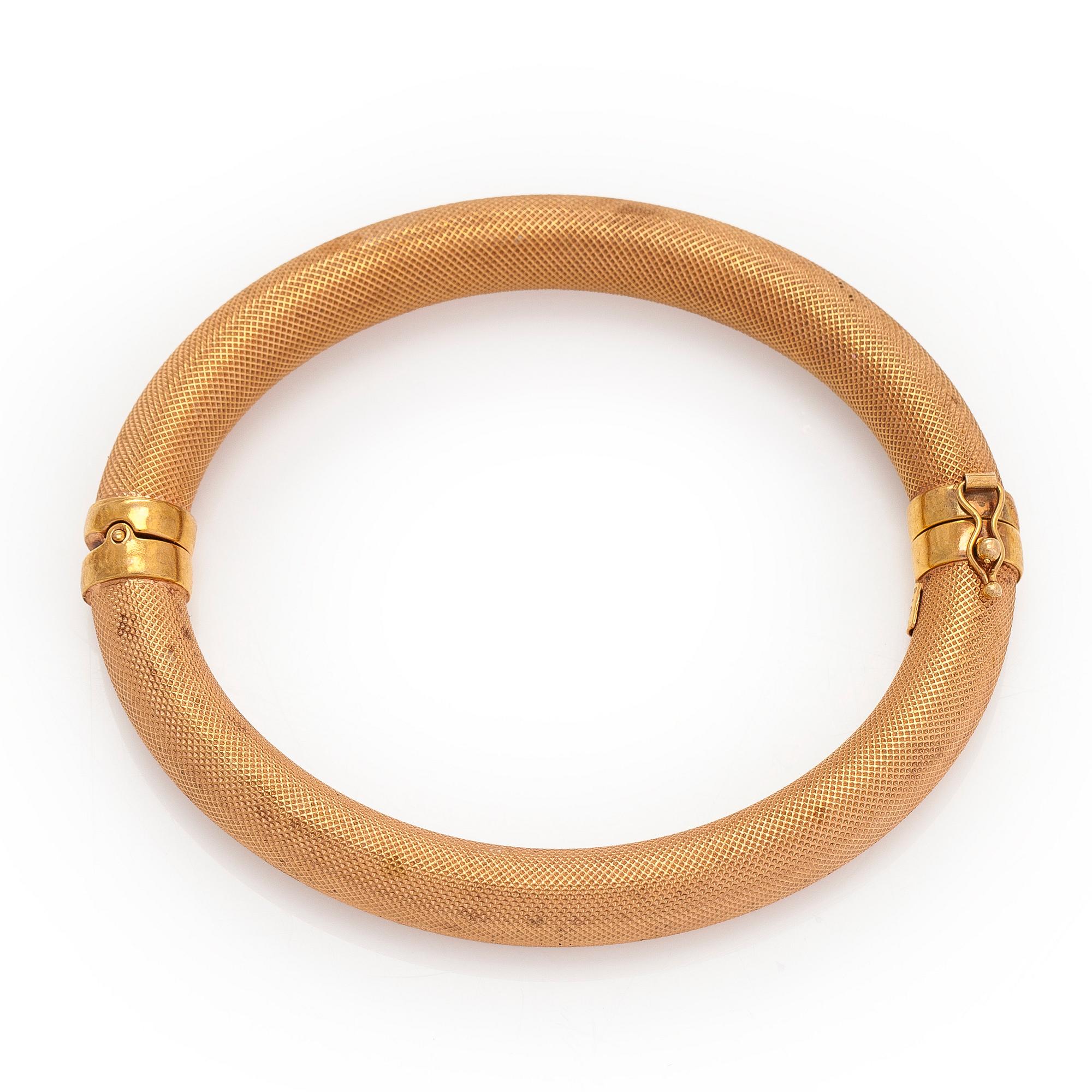 An 18K gold bracelet, Italy.