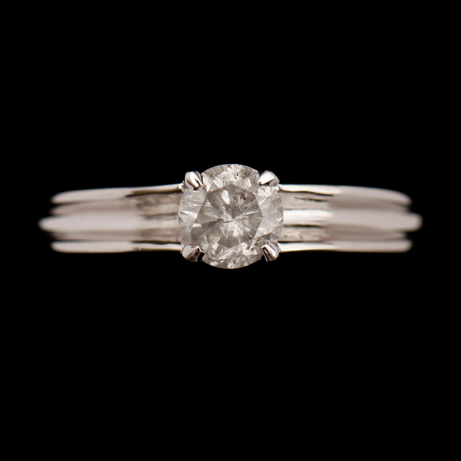 RING, 14 k vitguld, med solitär briljantslipad diamant 0.62 ct.