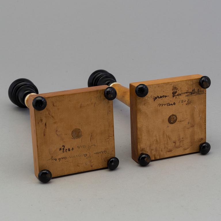 A pair of birch candles by Karl A Axelsson, konstsvarvare, Eksjö, 1907.