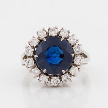 A sapphire and diamond ring.