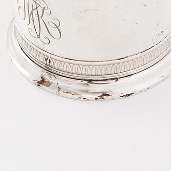 K. Fabergé, a pair of parcel-gilt silver teaglass holders, Imperial Warrant mark, Moscow 1908-17.