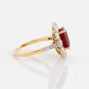 An 18K gold and platinum ring set with a faceted ruby weight ca 3.35 cts.