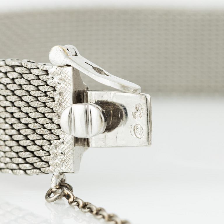 Bracelet, white gold with single-cut diamonds and sapphires.