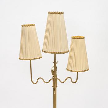 A Swedish Grace brass floor lamp, first part of the 20th Century.