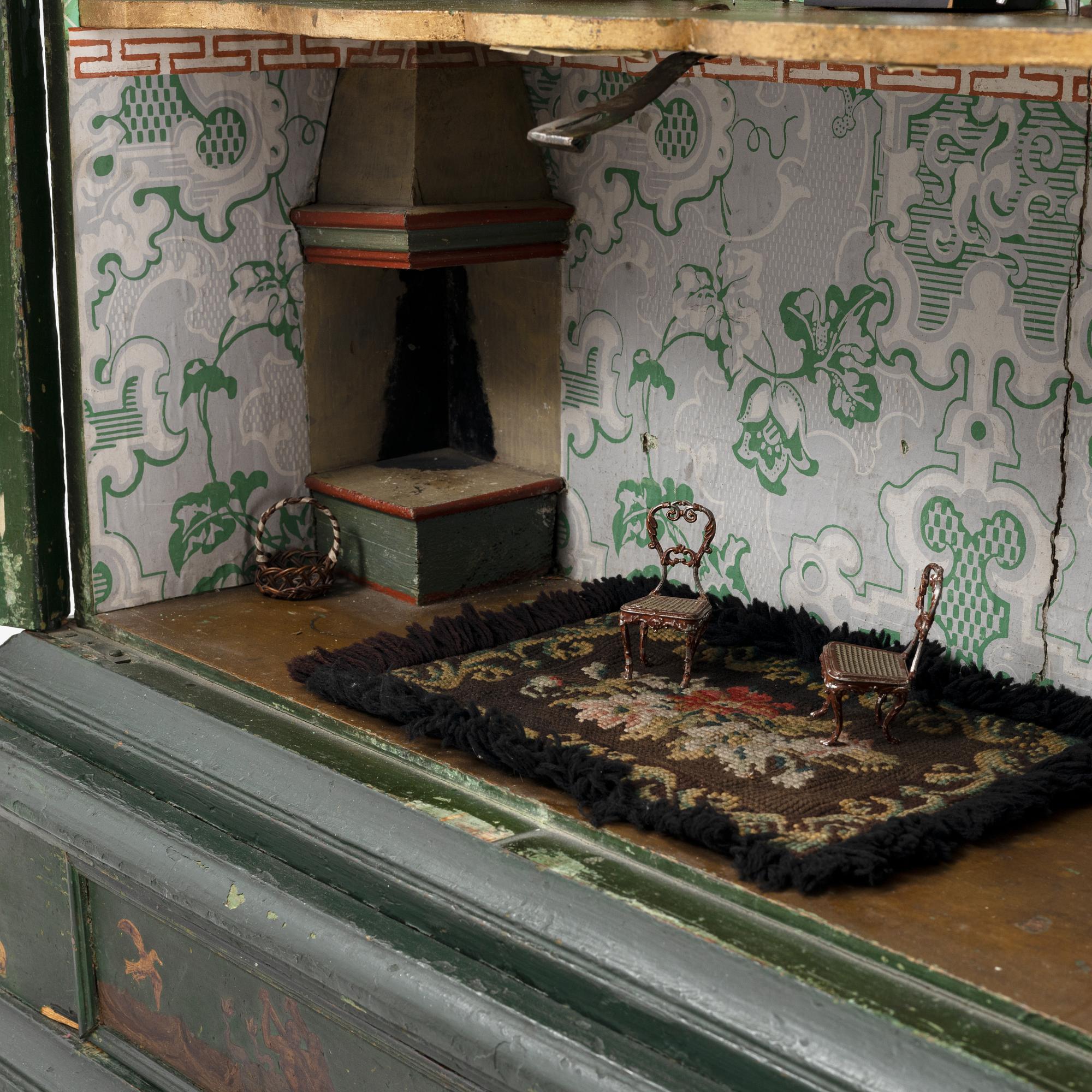 An 18th century cabinet / doll's house.