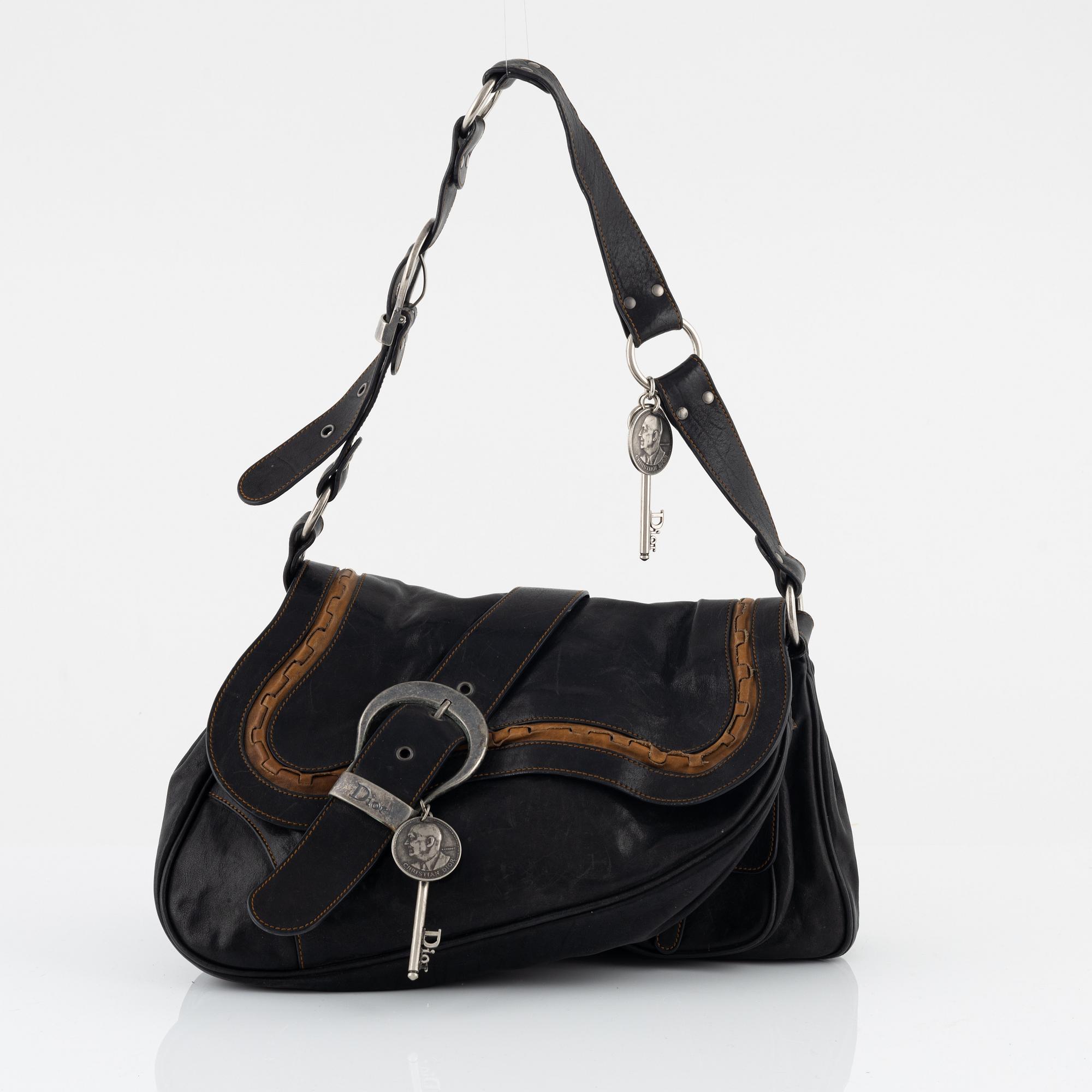 Christian Dior, a leather 'Gaucho saddle bag'.