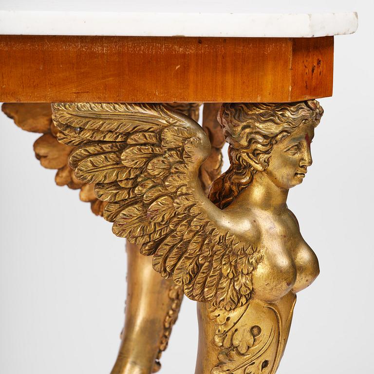 A presumably Austrian Empire centre table, early 19th century.
