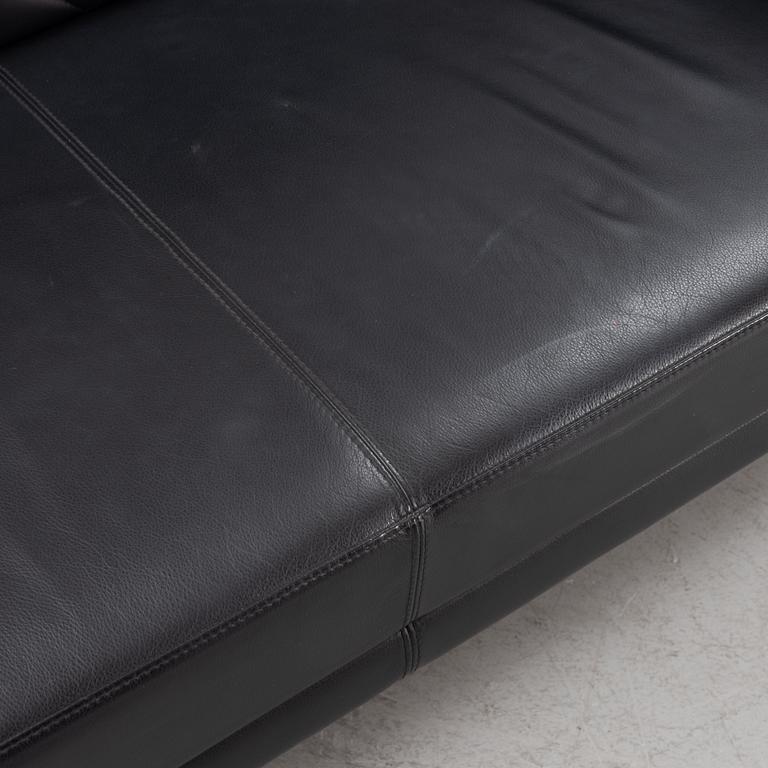 A leather upholstered sofa, 21st Century.