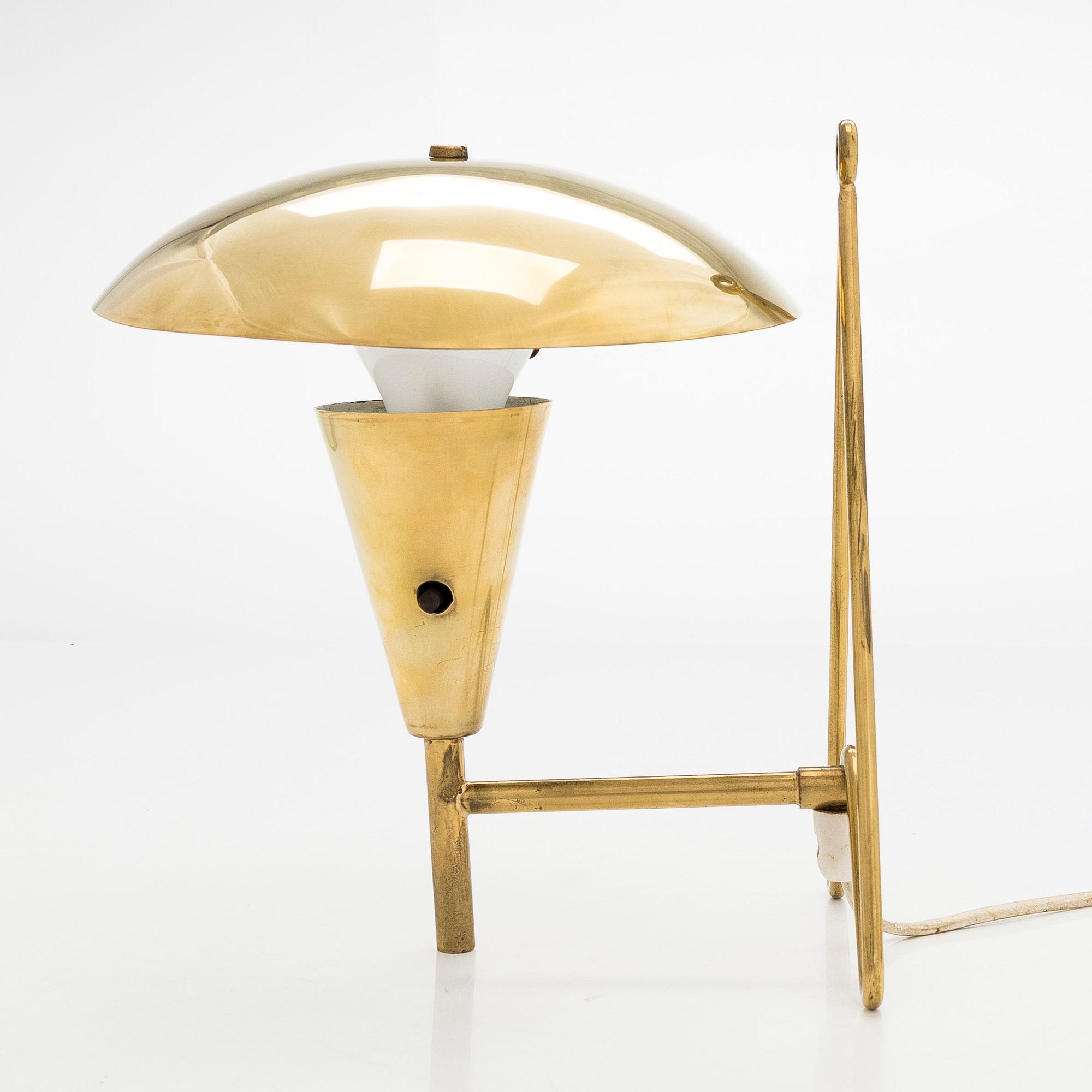 A mid-20th century model 'EV 57' wall / table lamp by Itsu.