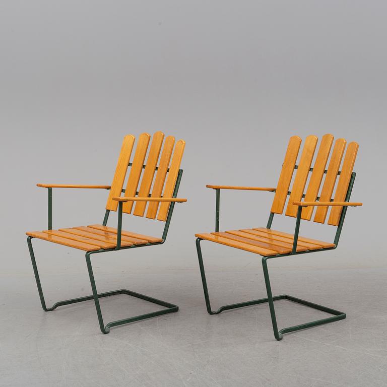 A set of five chairs and a table, Grythyttan, manufactured between 1954 and 1962.