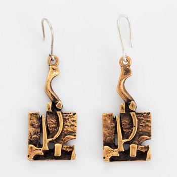 A pair of Jorma Laine earrings in bronze.