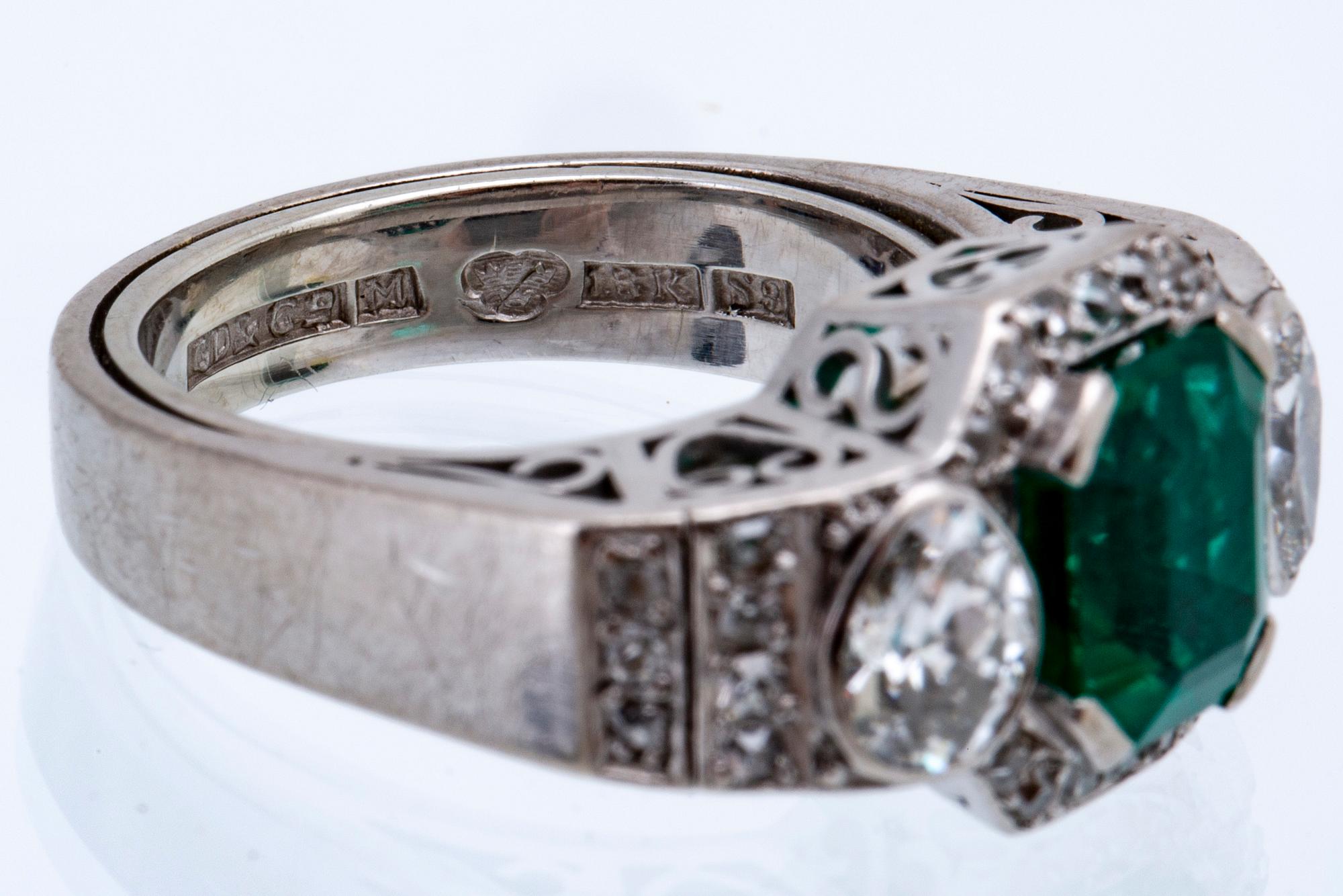 Ring 18K whitegold 1 emerald approx 2 ct and old-cut diamonds approx 1,5 ct, G Dahlgren & Co Malmö 1968.