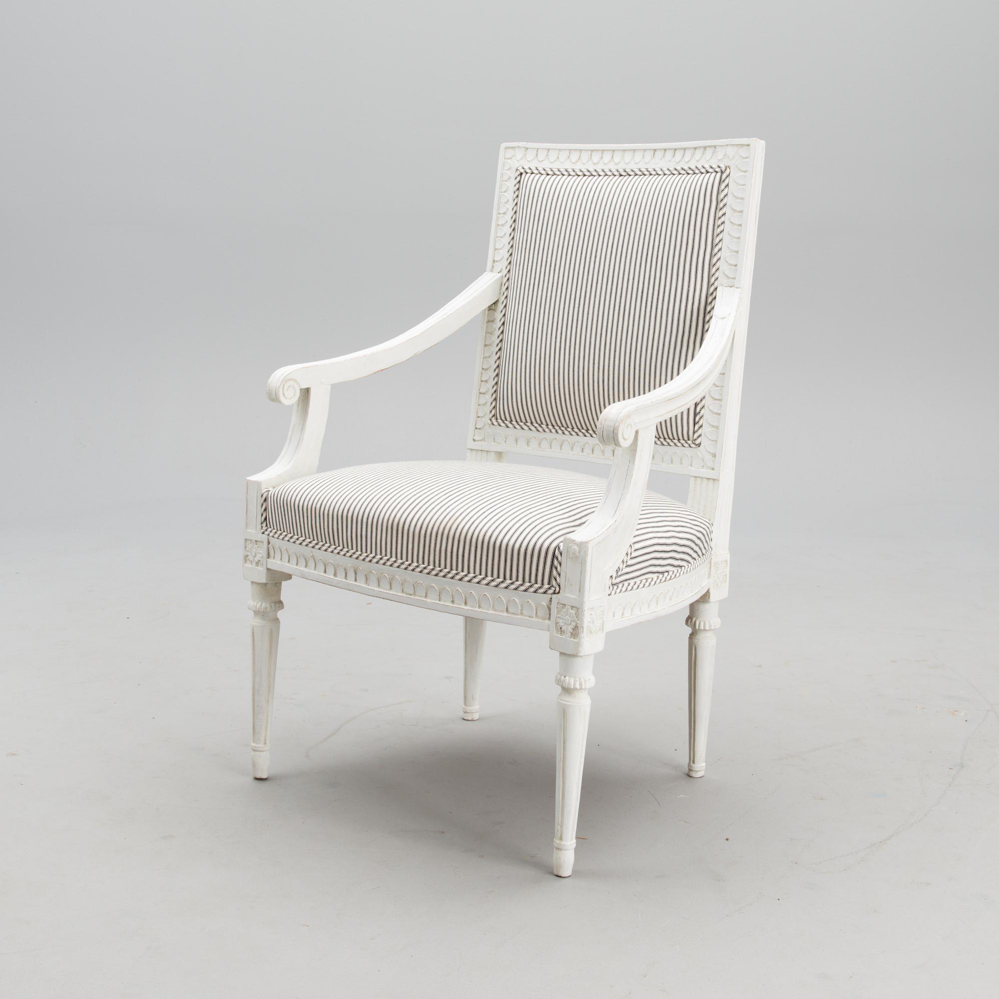 A late 18th century Swedidh Gustavian open arm chair.