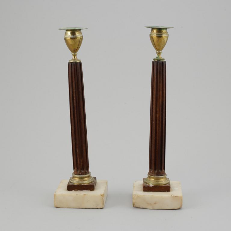 A pair of late Gustavian late 18th-century candlesticks.