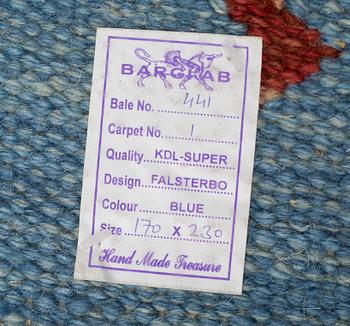 A RUG, "Falsterbo blue", flat weave,  ca 234,5 x 171 cm, it has a signature.