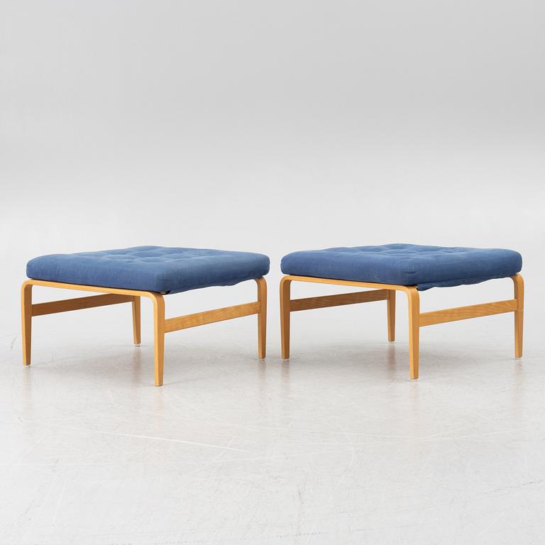 Bruno Mathsson, a pair of armchairs with ottomans, 'Ingrid', Dux, second half of the 20th century.