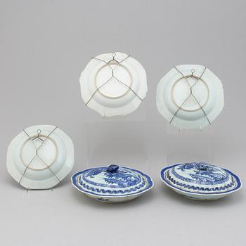 Two blue and white export porcelain tureens with covers and three dishes, Qing dynasty, 18th century.