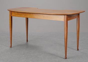 A Josef Frank mahogany desk, model 991, by Svenskt Tenn.
