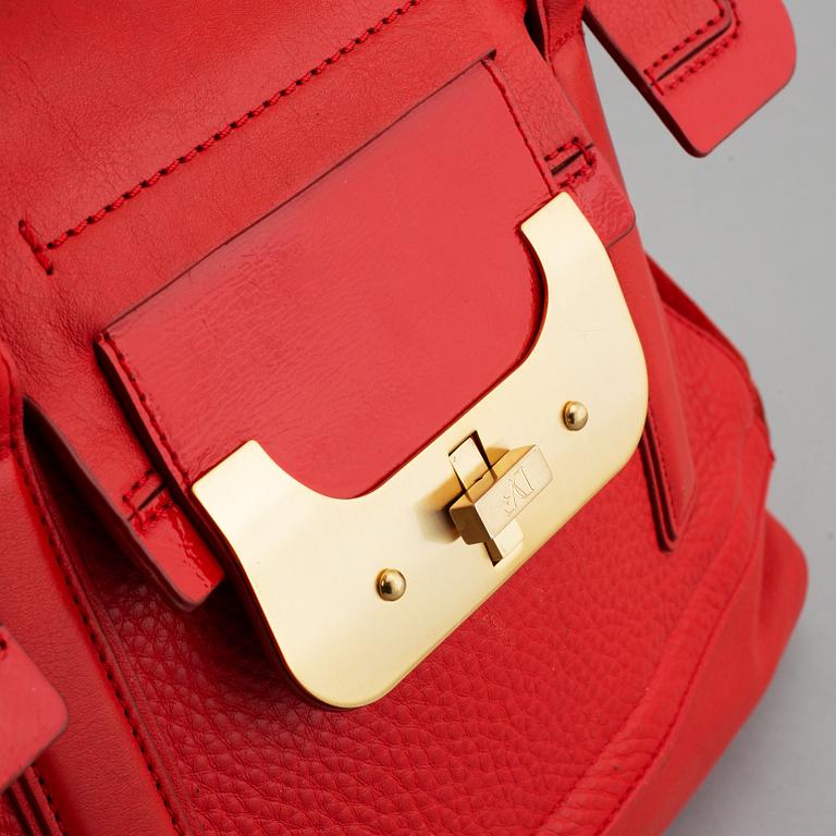 Diane von Fürstenberg a red leather handbag and wallet.
