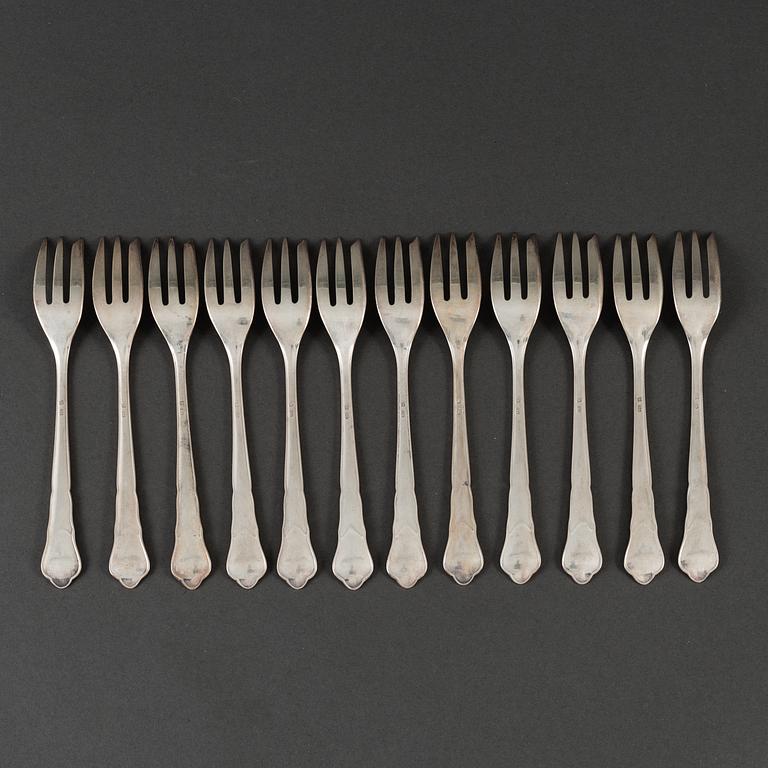 Tweleve silver cake forks, mid 20th century.