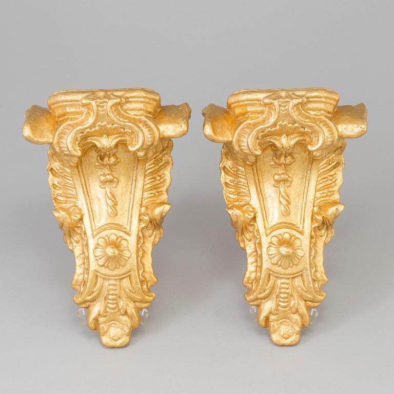 A pair of late 20th century wall brackets.