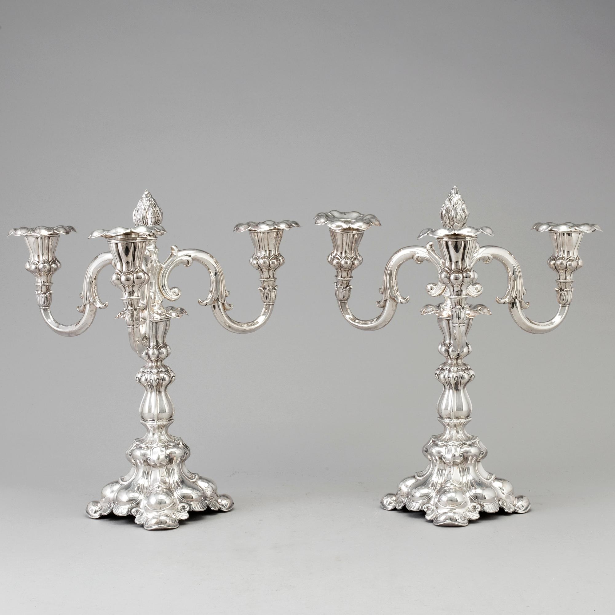 A pair of silver candelabras from CG Hallberg, Stockholm 1935.