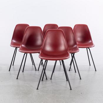 A set of six CHARELS AND RAYE EAMES DSX chairs.