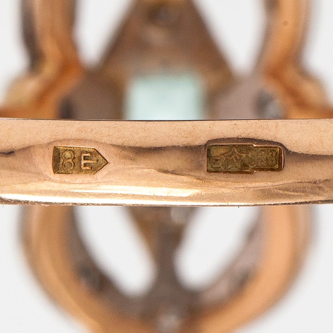 A 14K gold ring with an beryl and diamonds ca. 0.55 ct in total. Soviet union.
