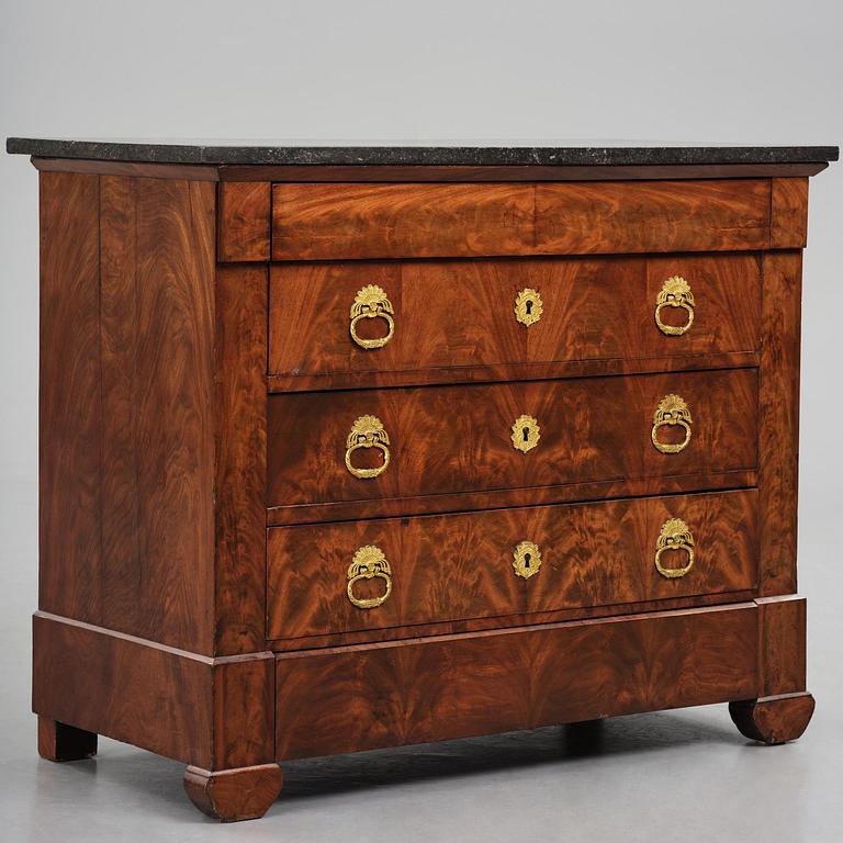 A French Empire mahogany commode, early 19th century.